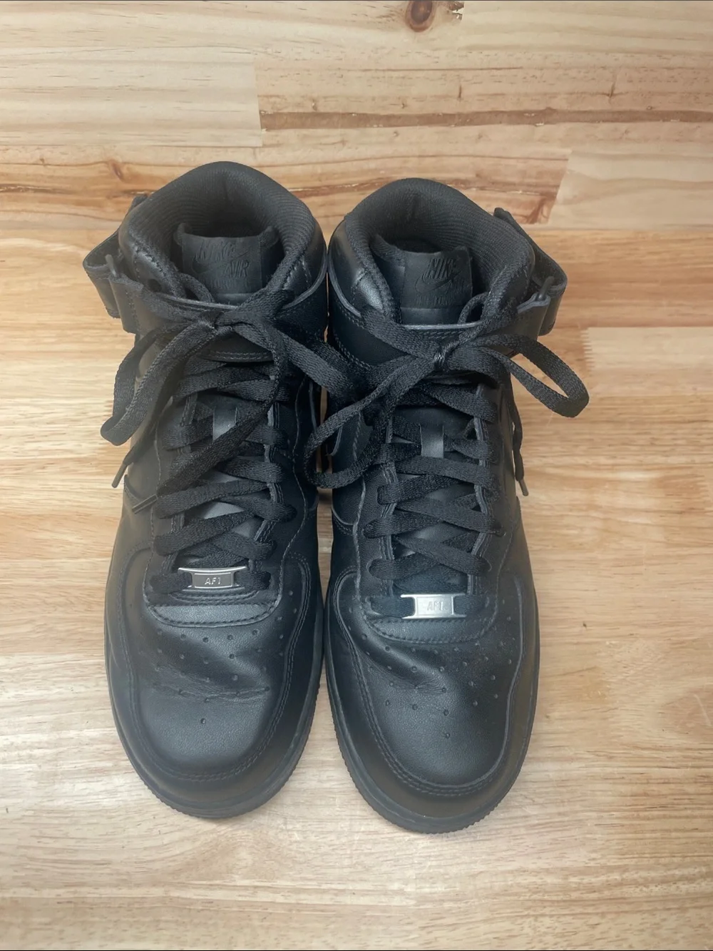 Nike Men’s Air Force 1 Black High-Top Leather Sneakers